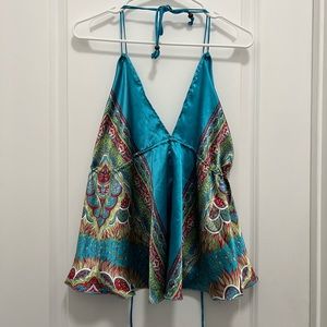 A super cute blue silk bohemian tank top in perfect condition.